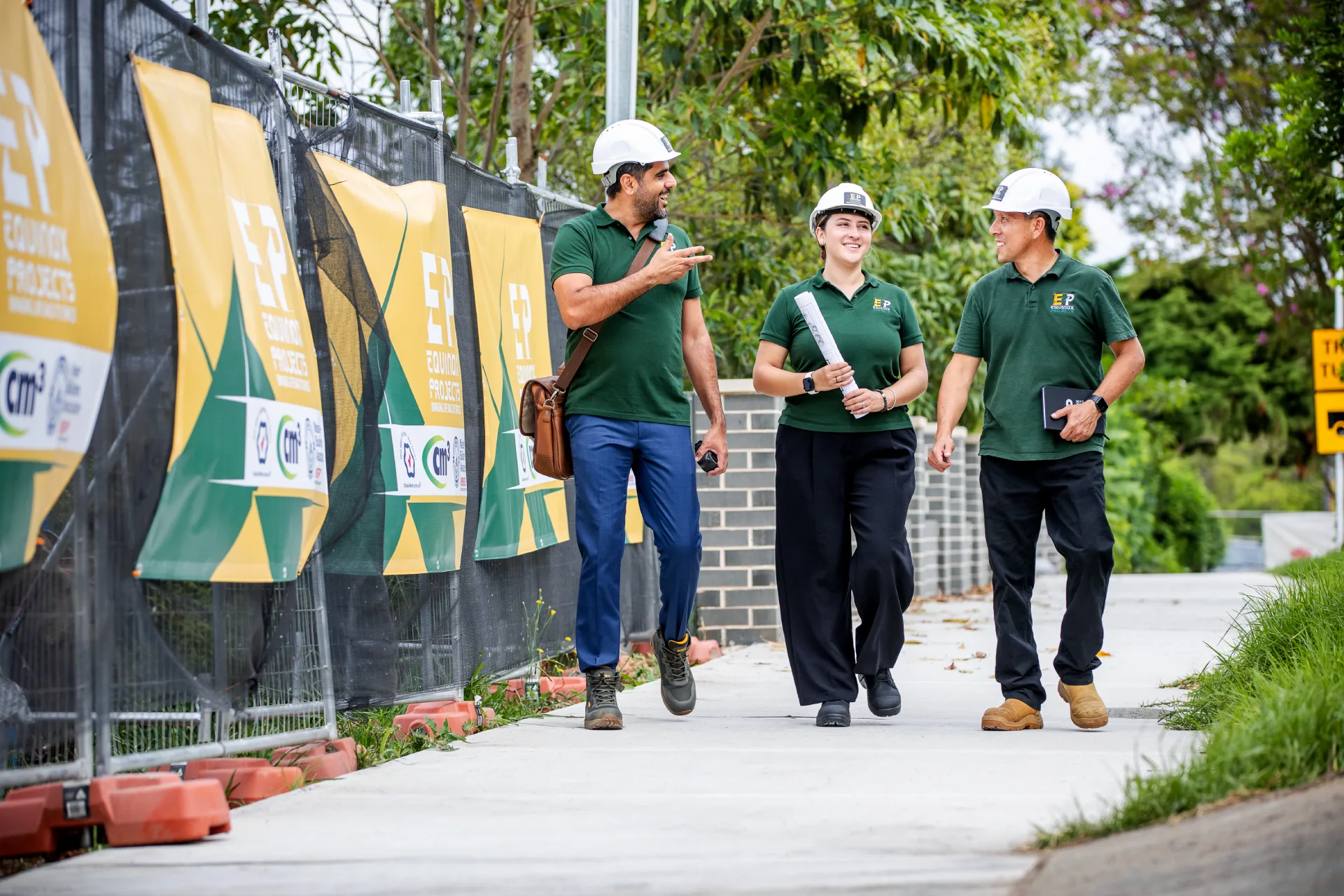 Equinox Projects site team reviewing drawings on a live construction site